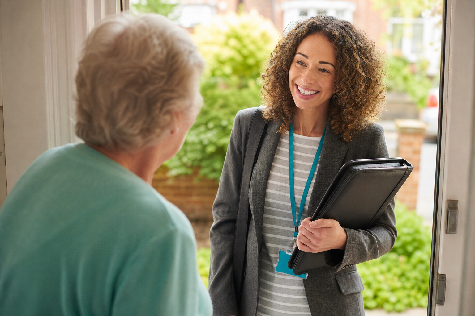 Care staff supporting older adults in the community